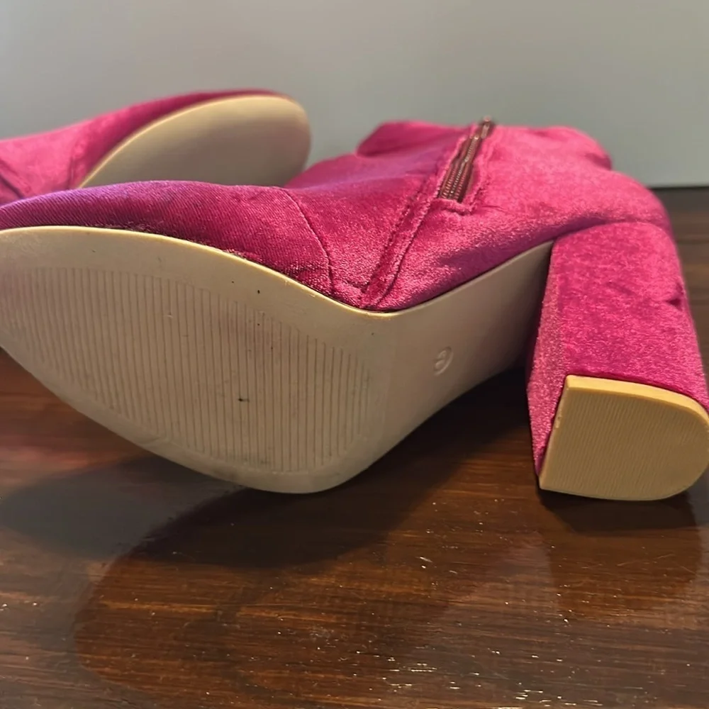 New but tried on Velvet Pink Ankle Boots. Size 9.5. Zip on side. Heel 4”.